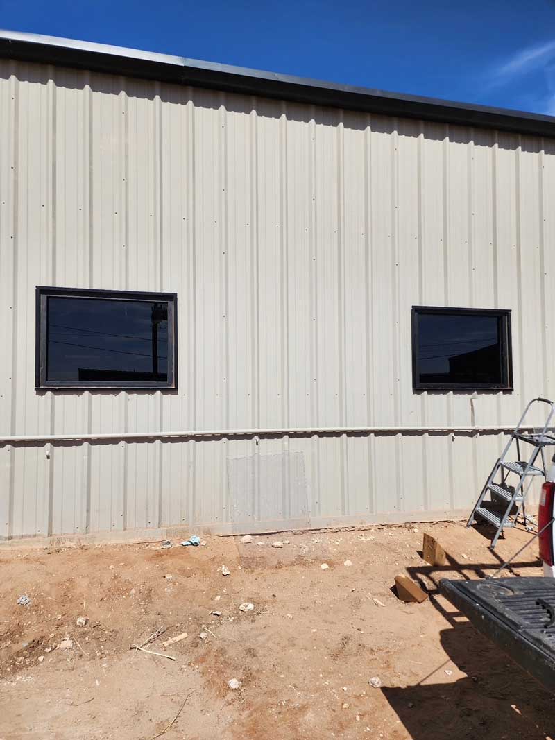 Finished window installation in metal industrial building